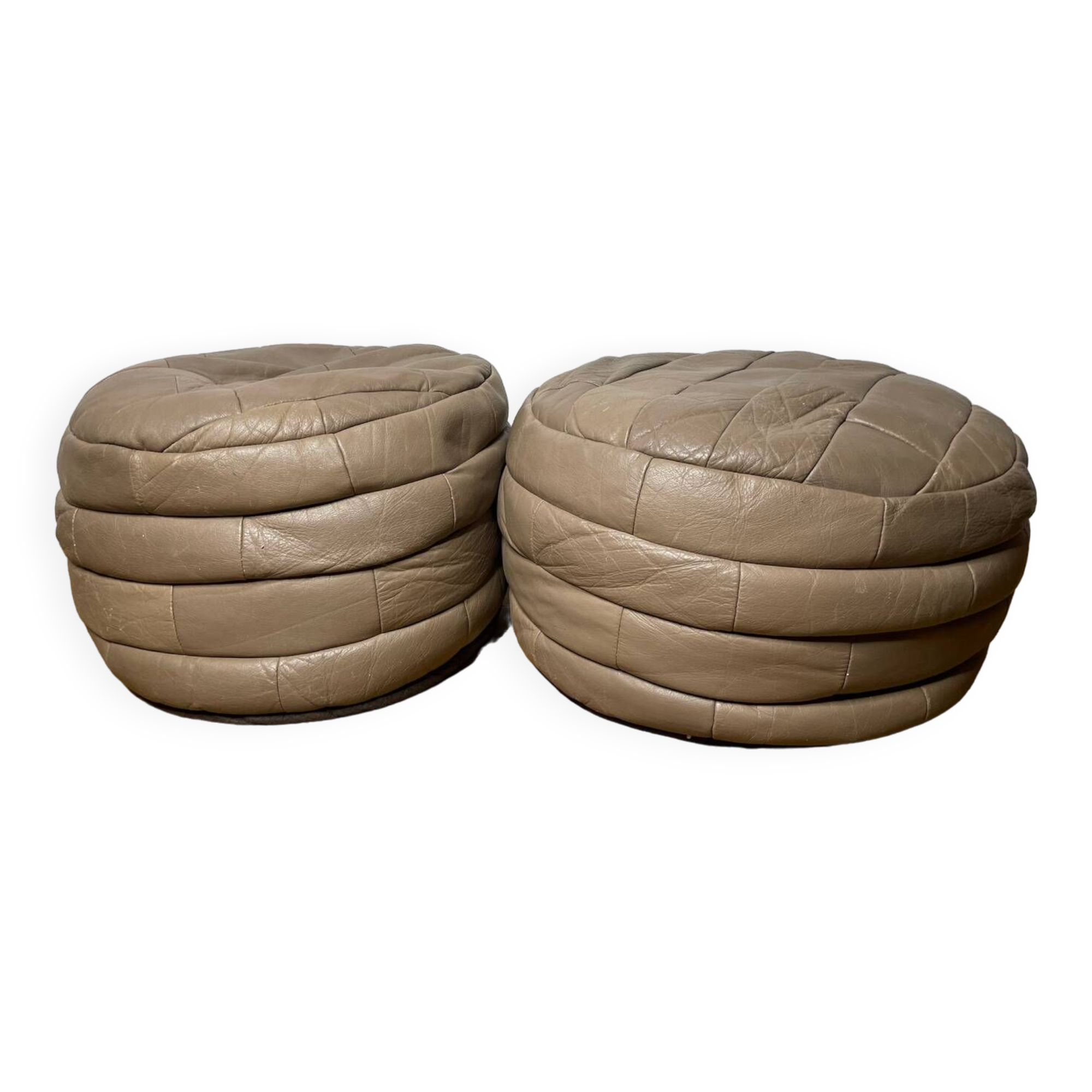 Pair of De Sède patchwork leather poufs