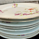 Set of 8 floral porcelain plates from the late 19th century.