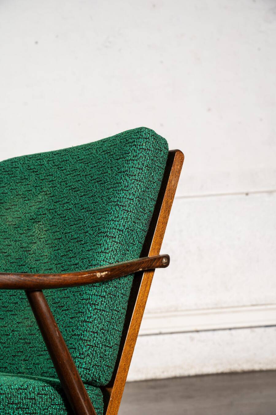 Boomerang chair in green fabric