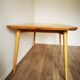 Numbered solid oak table designer