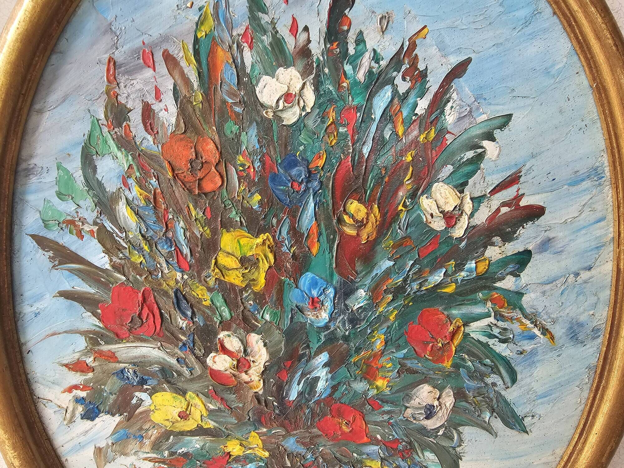 Oil painting on panel of a bouquet of colourful flowers in a vase, signed Valota.
