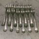 Christofle house 12 crossed ribbon oyster forks