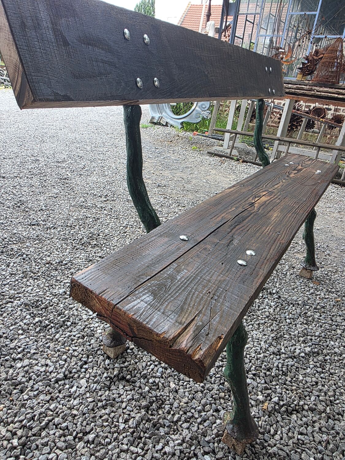 Cast iron garden bench with solid oak seat
