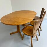 Antique round Scandinavian dining table from the 70s with 1 solid wood extension