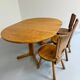 Antique round Scandinavian dining table from the 70s with 1 solid wood extension