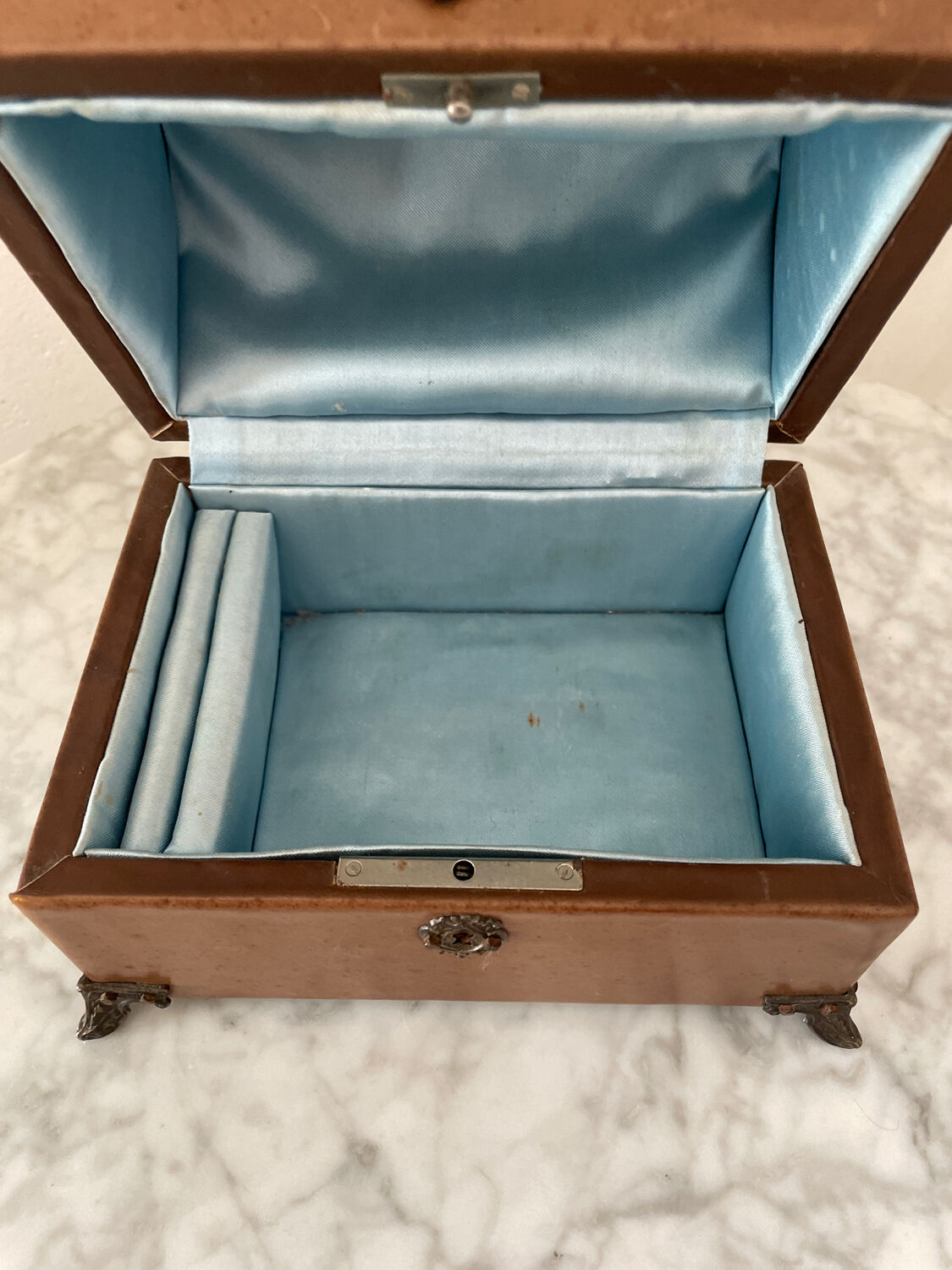 Vintage leather and silver metal jewelry box.