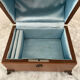 Vintage leather and silver metal jewelry box.