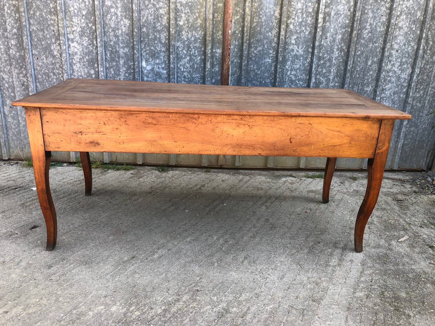 Antique solid cherry farmhouse table with 3 drawers and 2 pulls