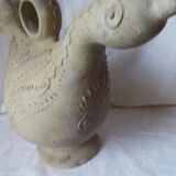 Old grey terracotta jug