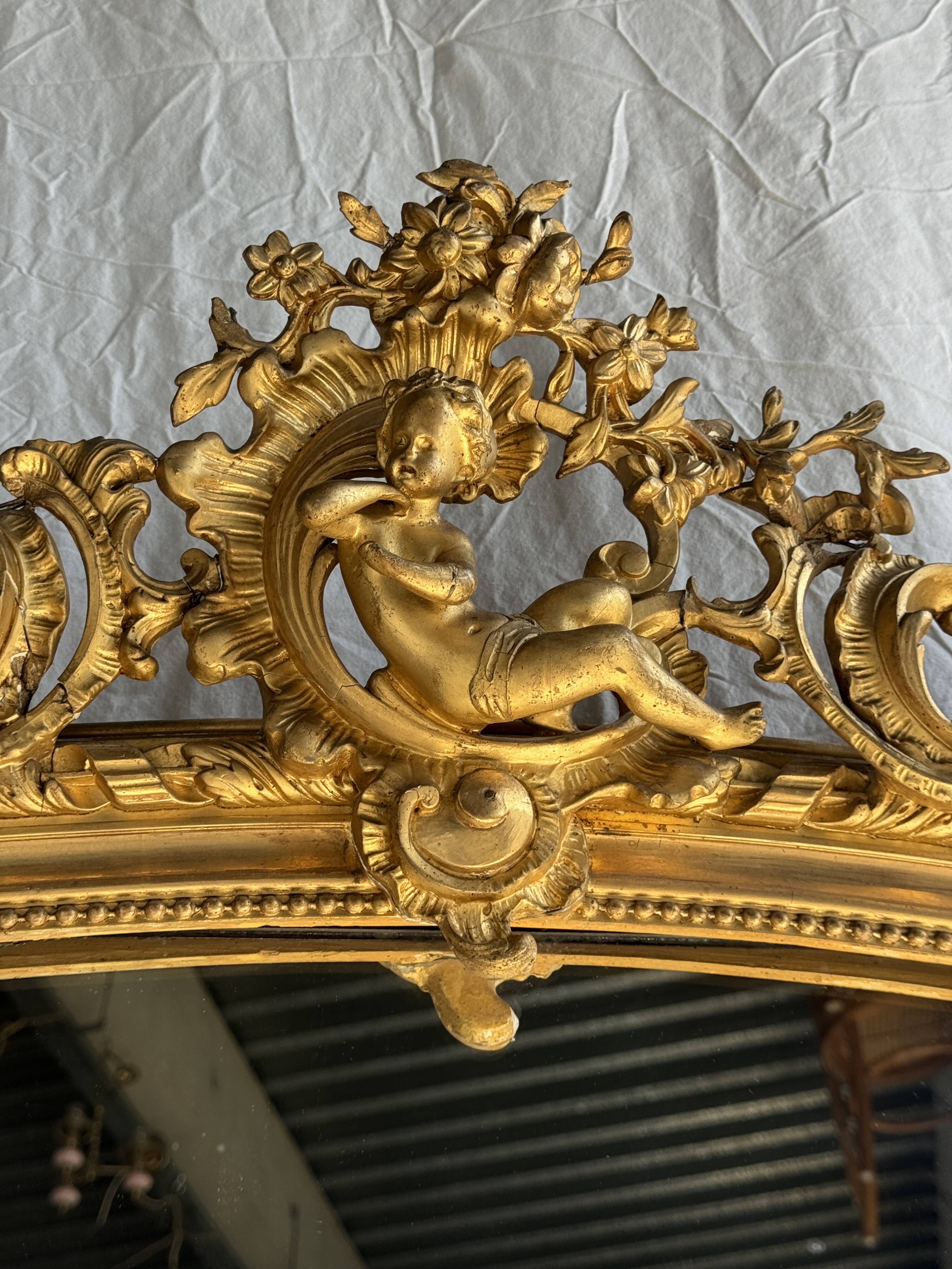 Large gilded mirror with acanthus leaf pediment H150 L98