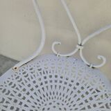 Pair of wrought iron garden chairs, antique manufacture