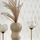 Pair of tulip-shaped candle holders in frosted glass and brass.