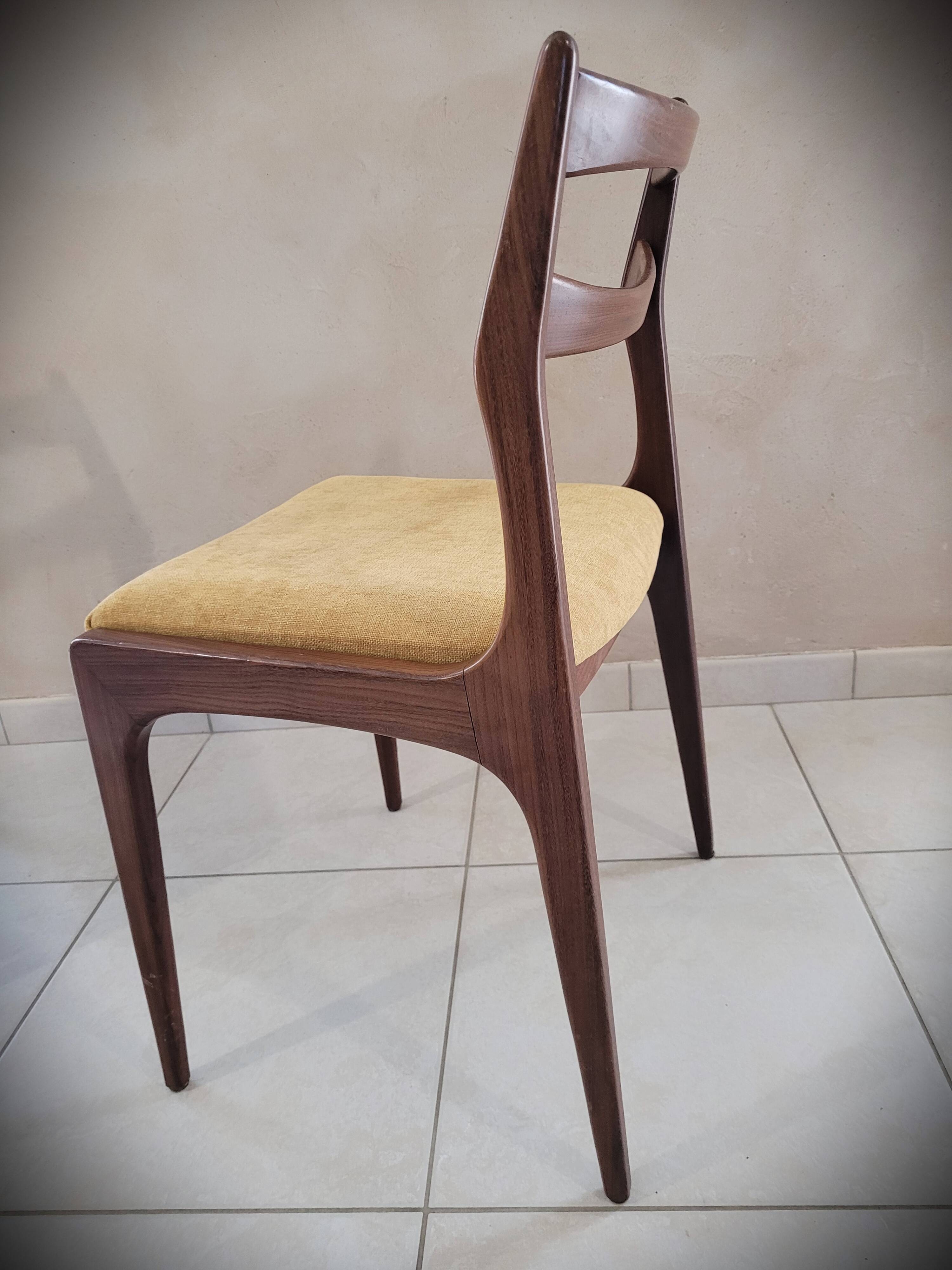 Set of 4 teak chairs with fabric seat in Scandinavian style.