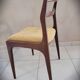 Set of 4 teak chairs with fabric seat in Scandinavian style.