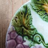 Old barbotine plate with vine motif