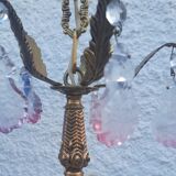 Antique chandelier with its papillae, reflection changing according to exposure