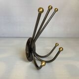 Small metal coat rack with six hooks