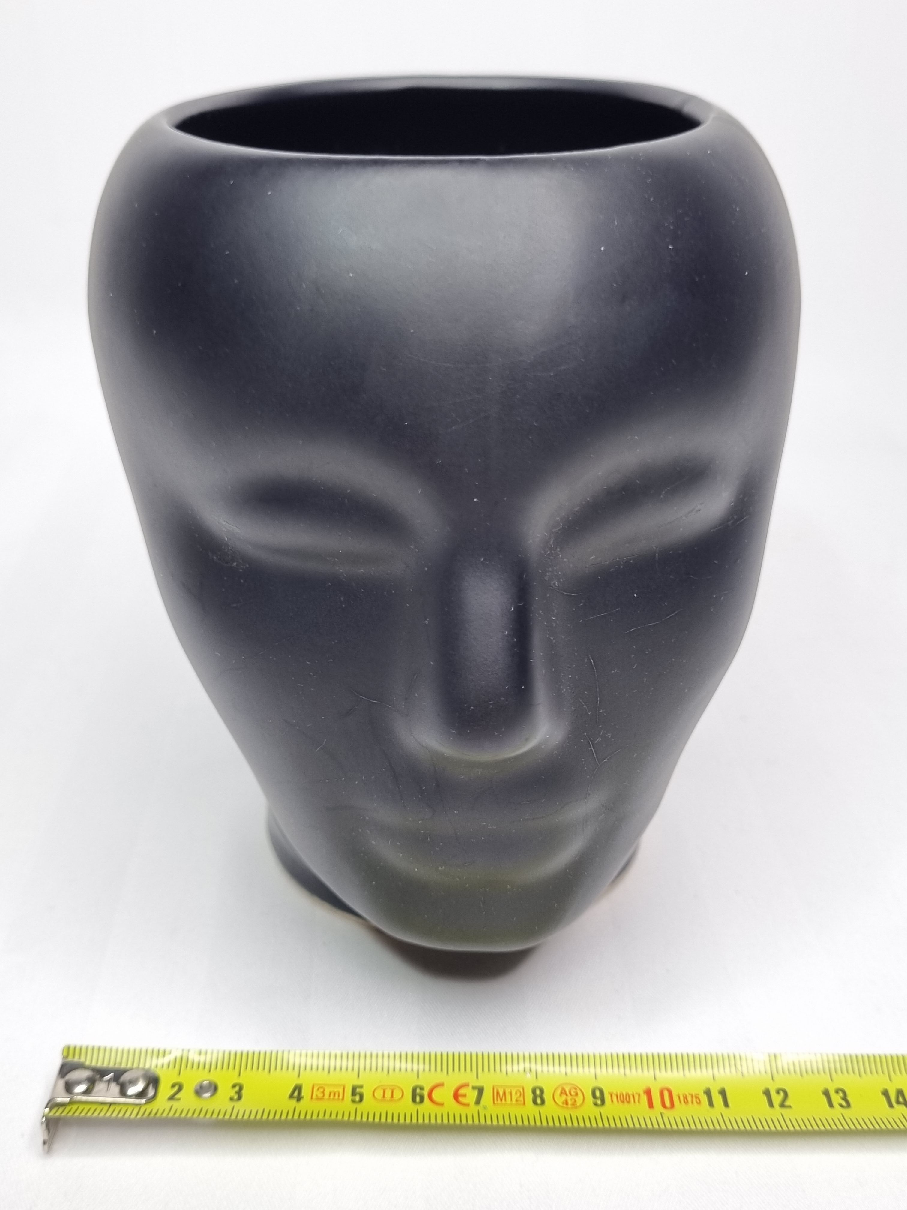 Anthropomorphic pot cover in matt black glazed ceramic, 80s