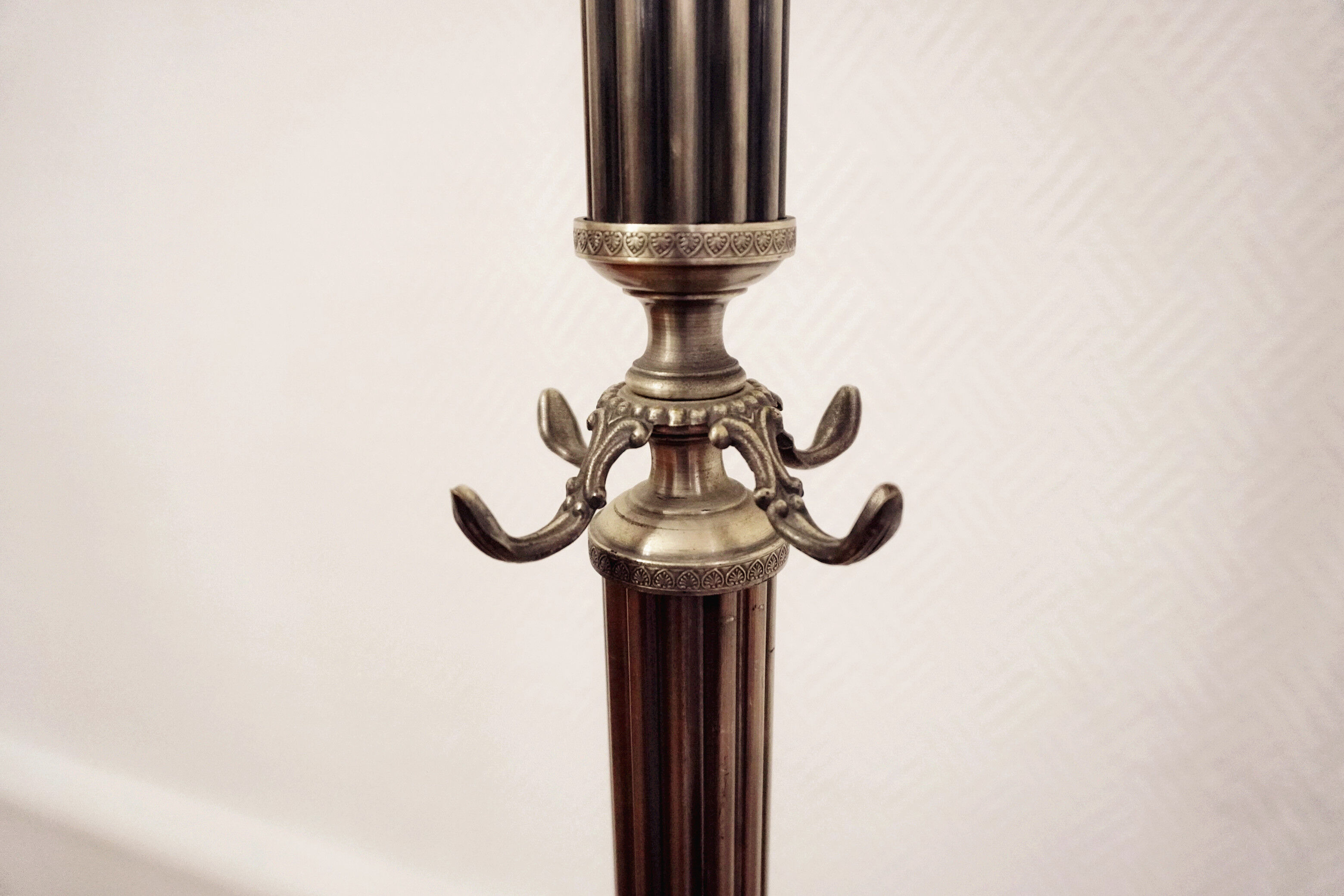 Brass revolving coat holder