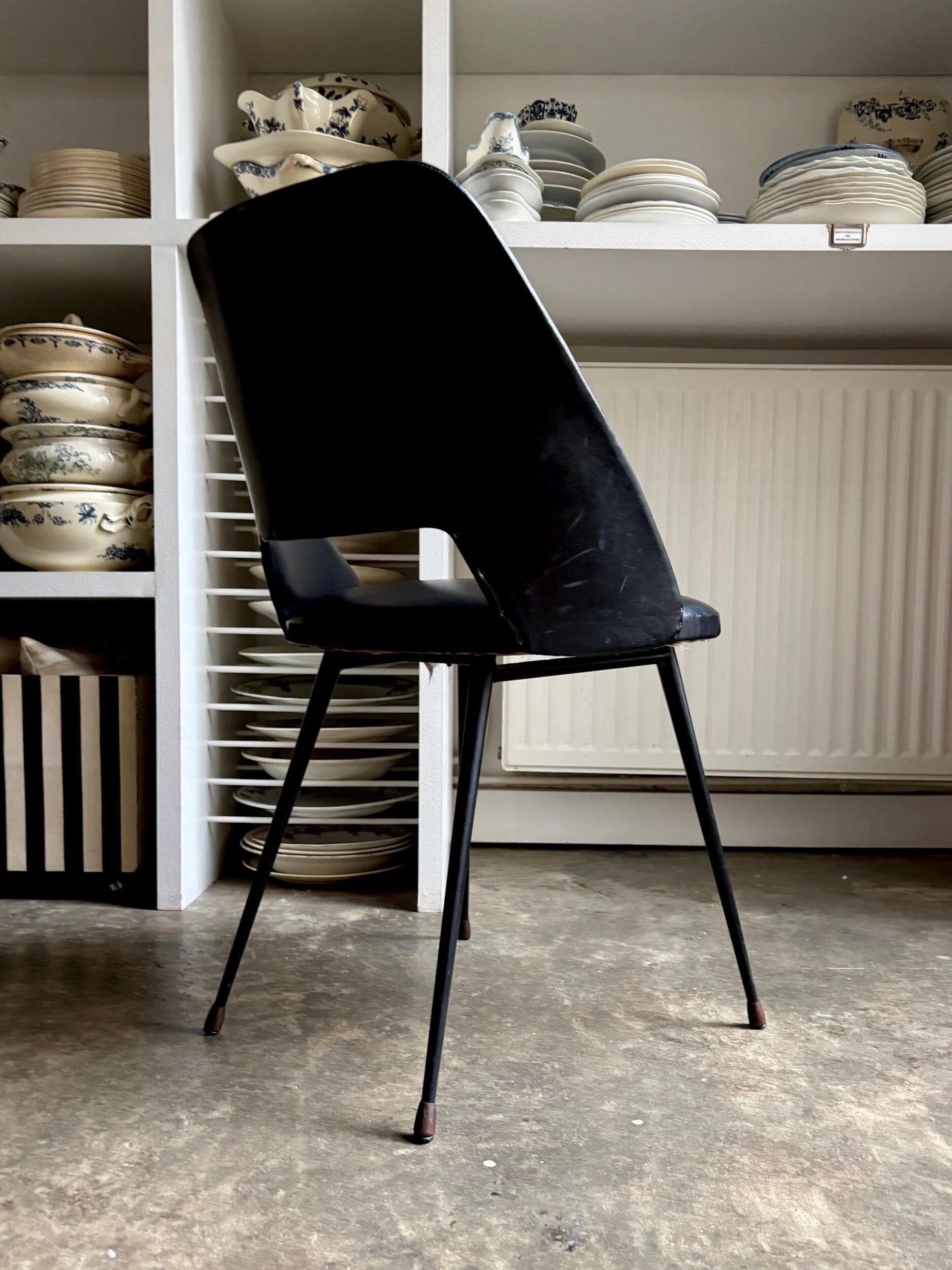 Chair in black faux leather