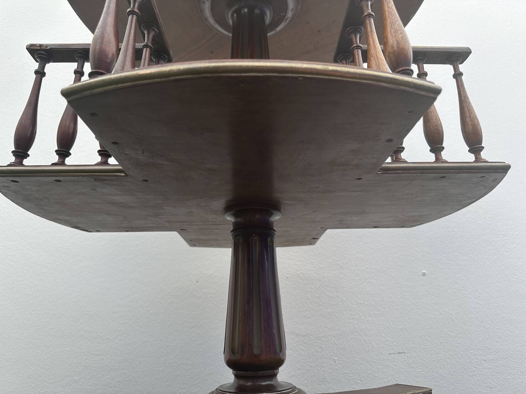 Old round and revolving wooden and brass library