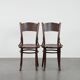 Set of two timeless vintage wooden Cosmos bistro design chairs