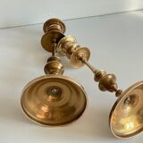 Pair of antique candle holders in solid brass