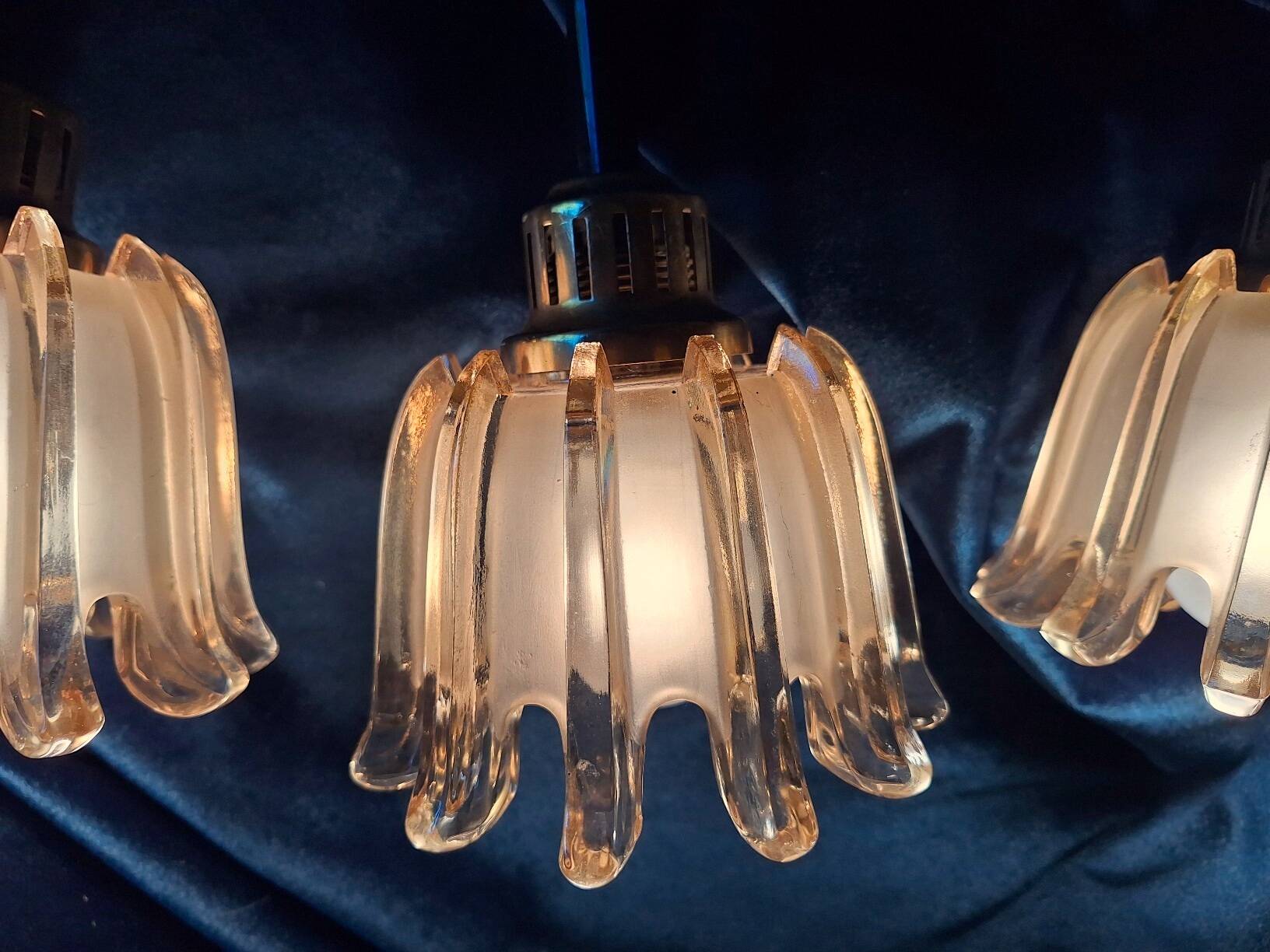 Set of 3 Doria pendant lights in brass and amber-coloured glass, 1960s