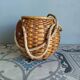 Wicker/rattan basket with handles