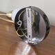 Swan neck wall light in brass and white opaline glass tulip.