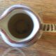 Small old ceramic milk jug from Quimper