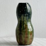 Very colorful glazed earthenware vase, old vase with floral decoration.