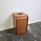 Industrial oak tambour cabinet from the 1930s, portable shape.