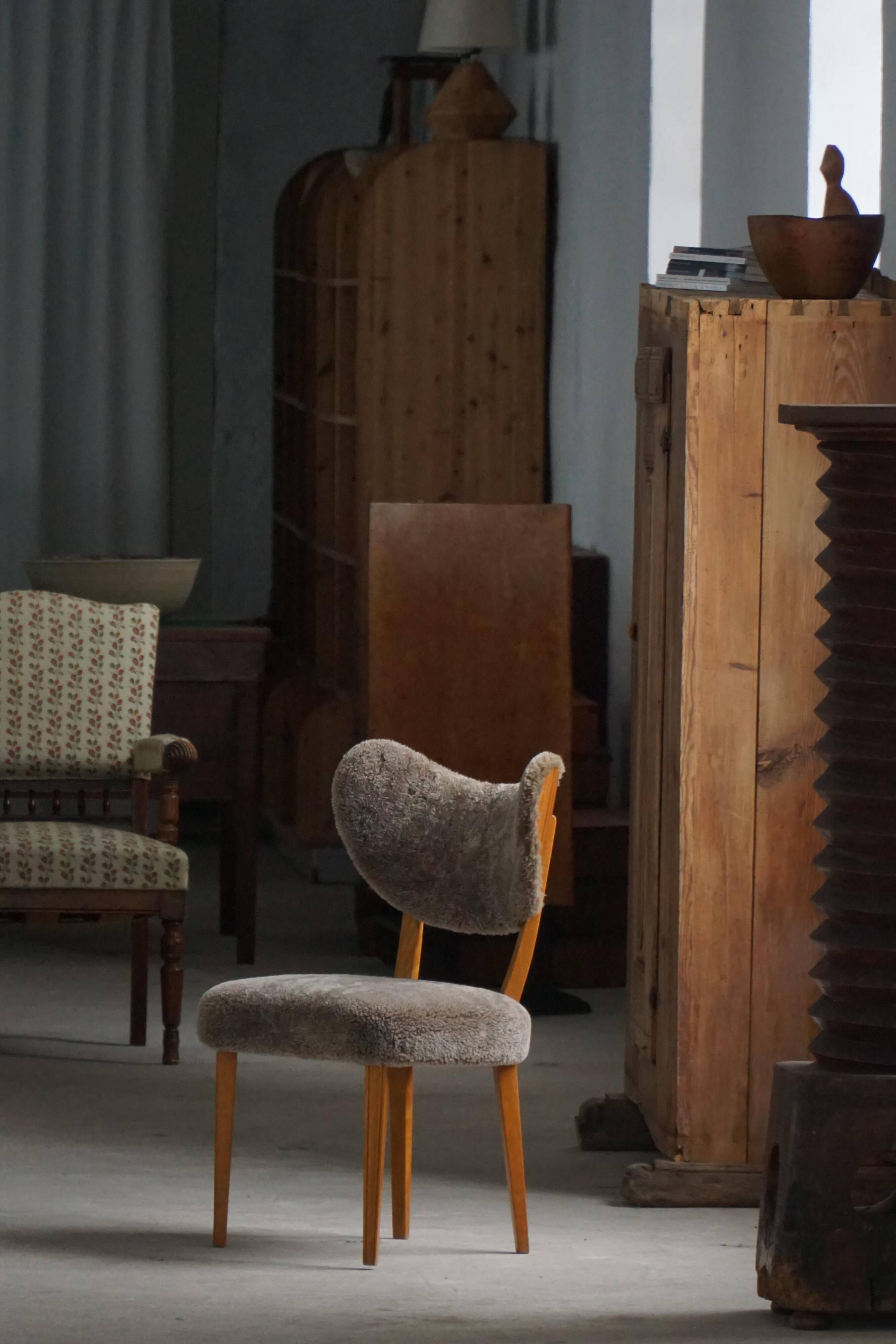 Danish chair from the mid-20th century, dining/office chair in lamb's wool, Eva Koppel, 1950s.