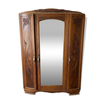 Antique carved wooden wardrobe with mirror
