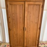 Vintage wardrobe in raw wood