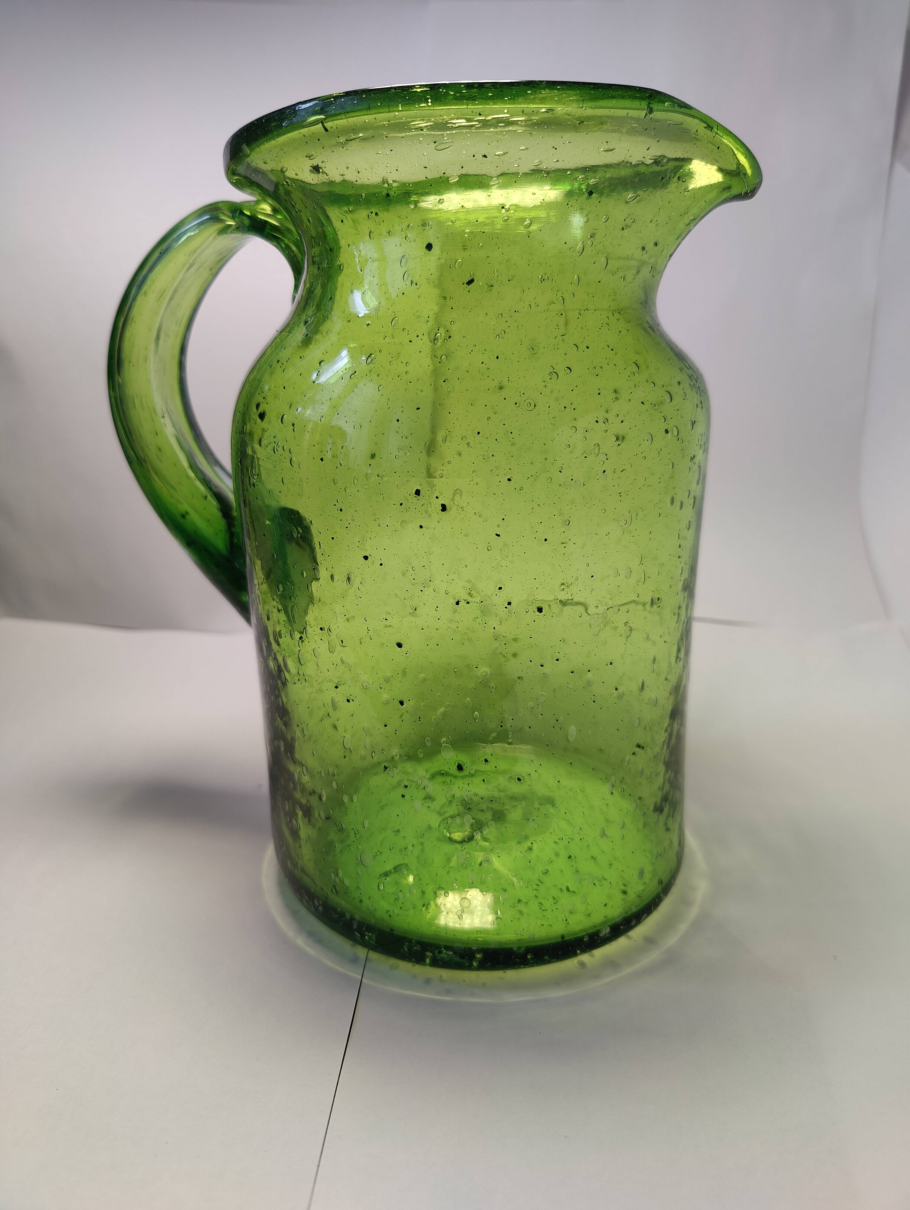 Bubble glass pitcher in the style of Biot or Empoli.