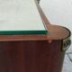 Vintage bedside table with a mirrored top, Art Deco style.