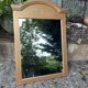 Golden mirror with wheat decoration