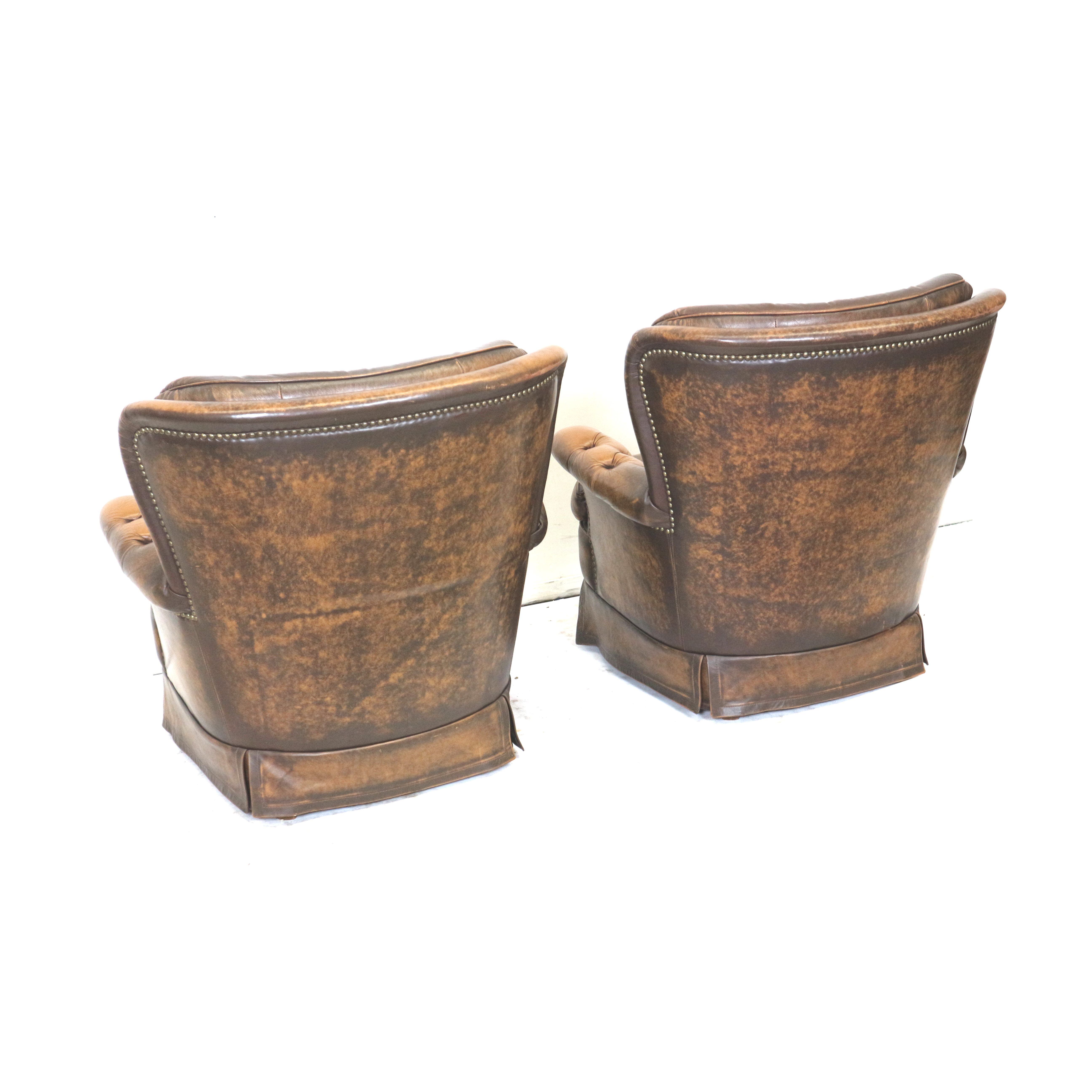 Set of 2 leather armchairs from the 1970s