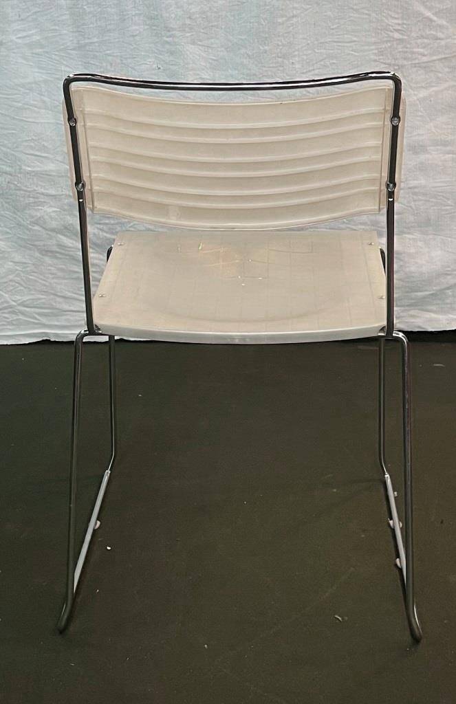 Set of 4 Italian Spilimbergo chairs in chromed steel and white plastic