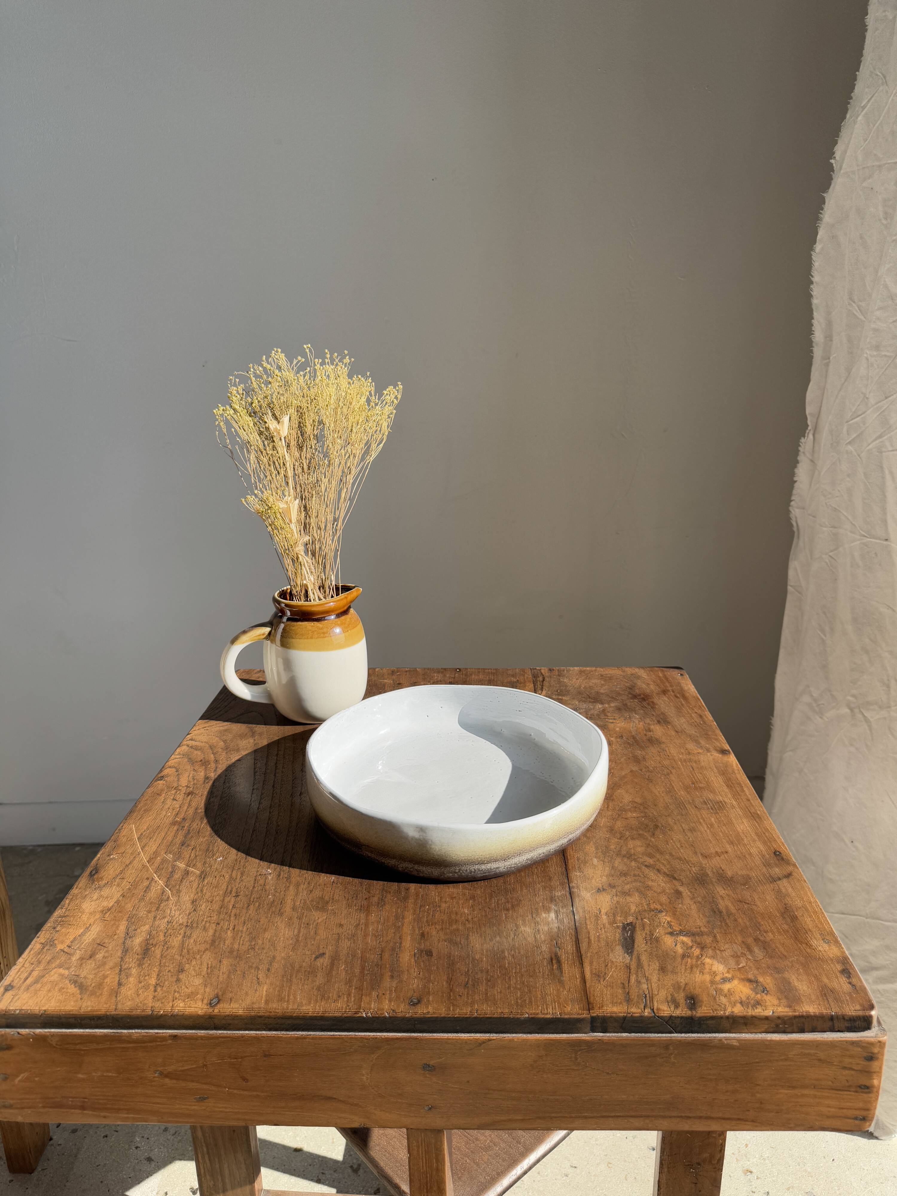 Large white and earthenware ceramic dish