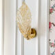 Amber Murano glass leaf wall light
