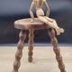 Tabouret tripode pieds boules