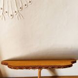 Console covered in velvet to hang