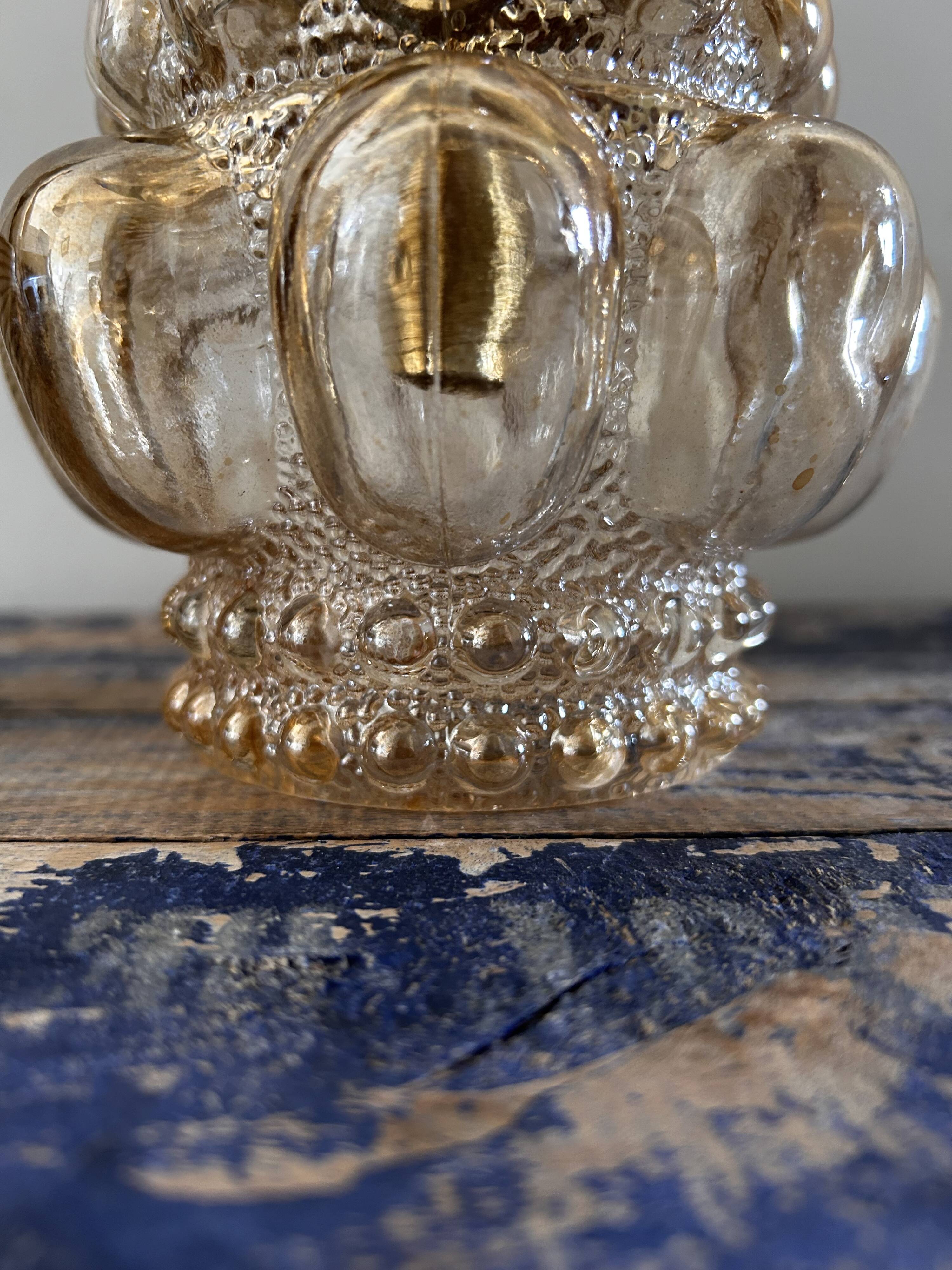 Bubbled glass wall light