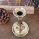 Push candle holder with hollow dish