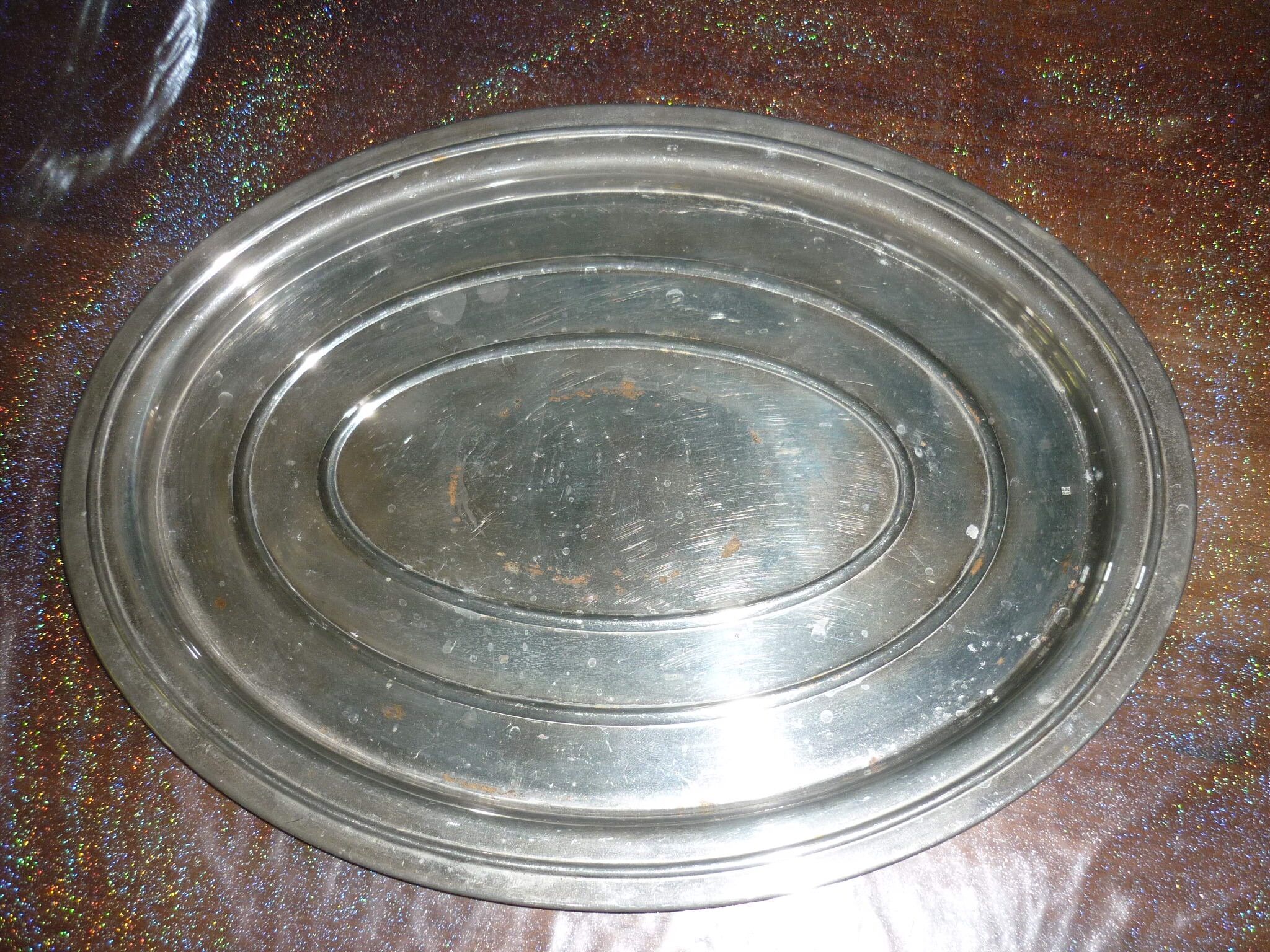 Silver metal oval top