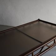 Dark rattan glass coffee table | 1980s