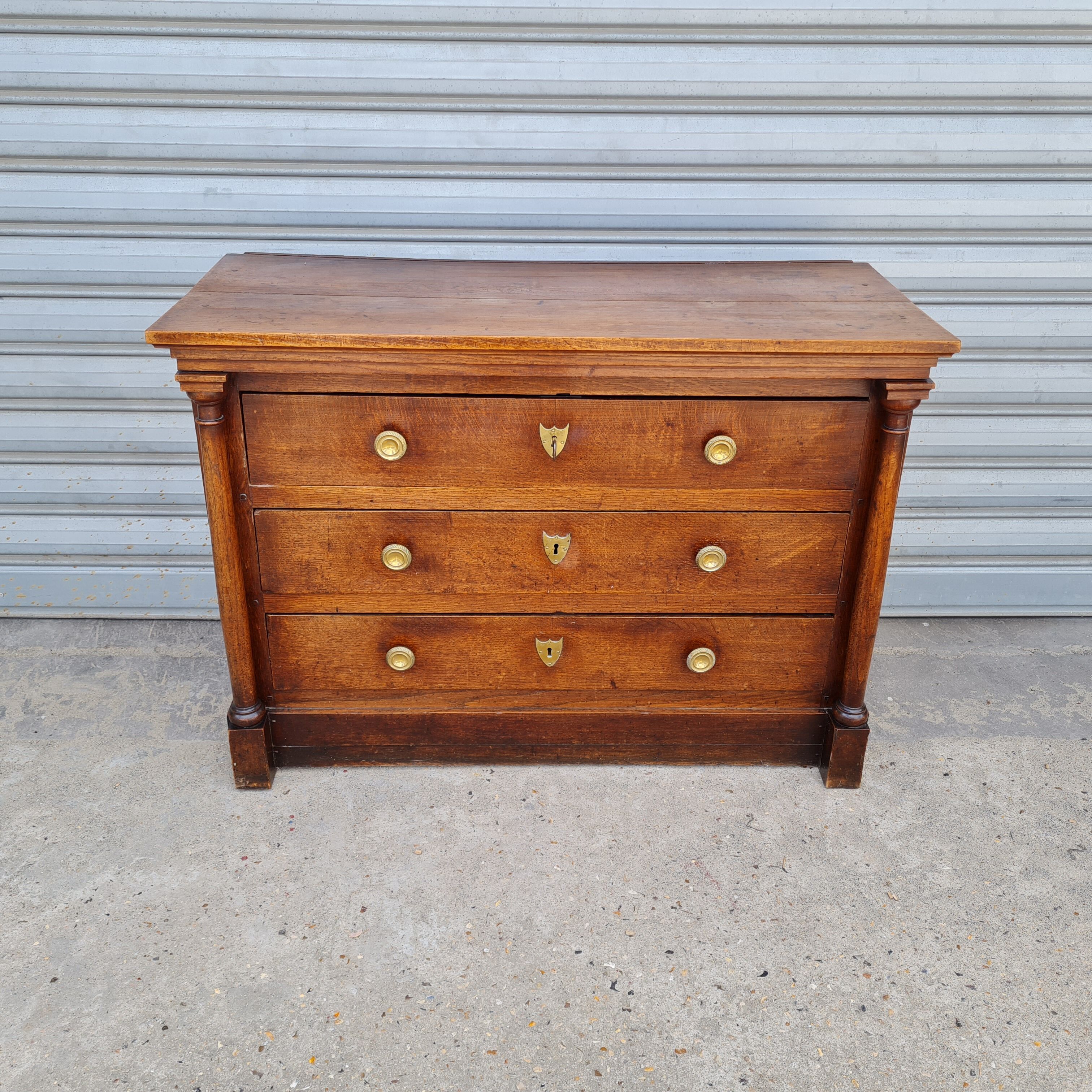 Empire period chest of drawers in light oak